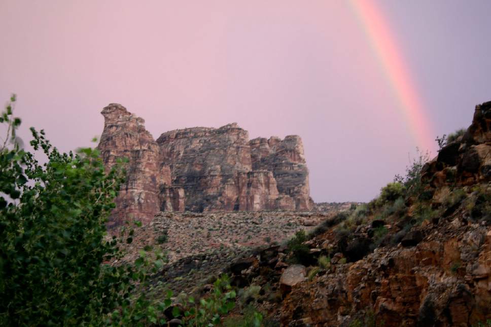 (Al Hartmann | Tribune file photo) Rainbow forms at the end of the day in Dark Canyon Wilderness in San Juan County. The area is included for a proposed Bears Ears National Conservation Area.