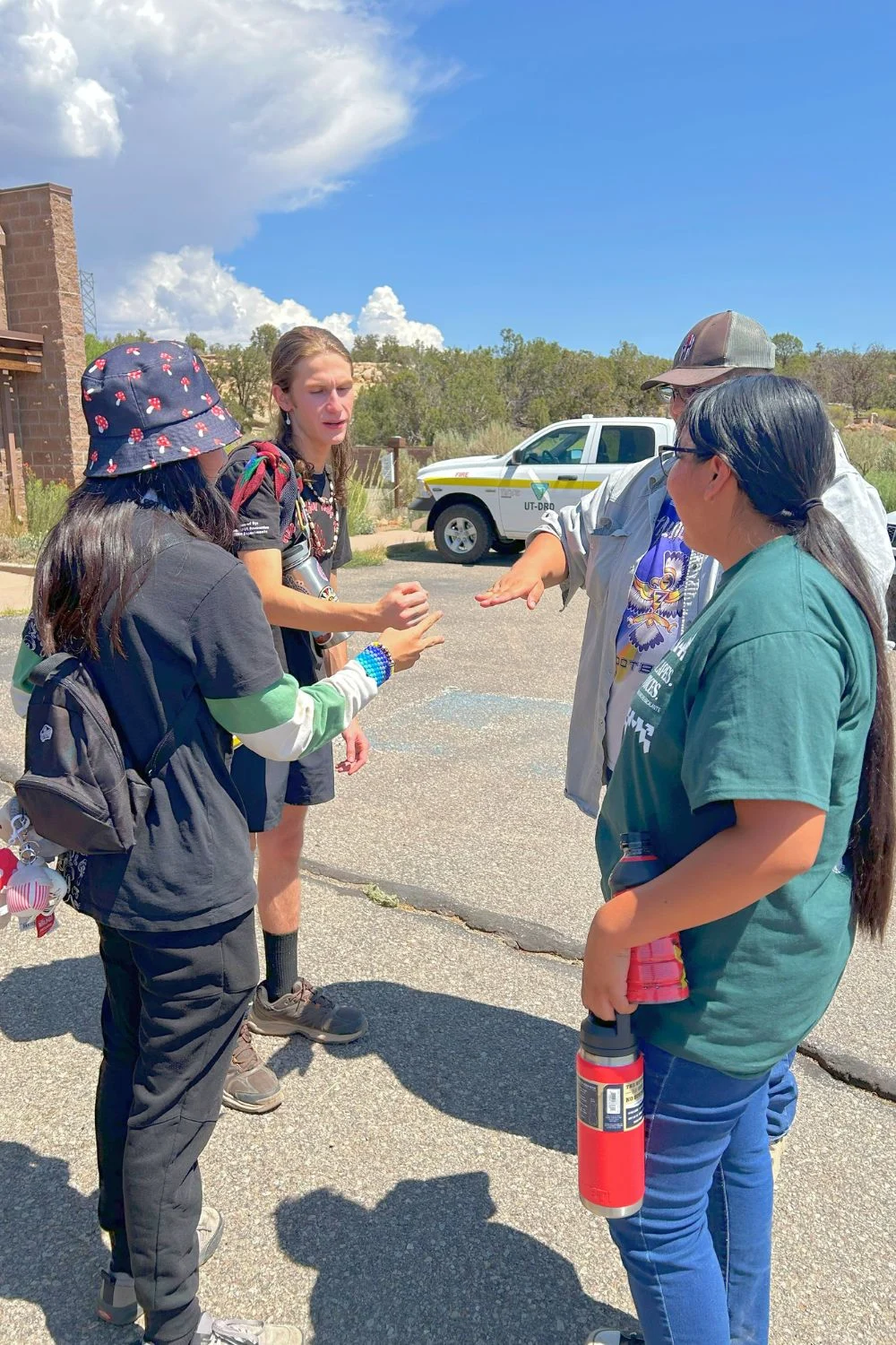 BEYC-kagalia Bears Ears Youth Council participants talk during a field activity.